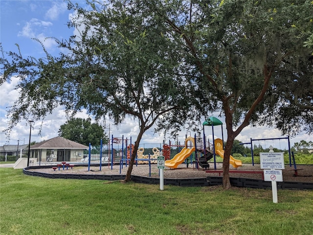 view of playground with a yard and a gazebo