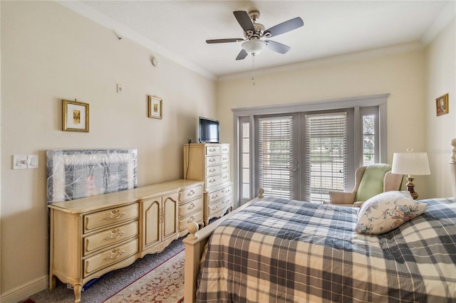 bedroom featuring carpet floors, ceiling fan, and ornamental molding