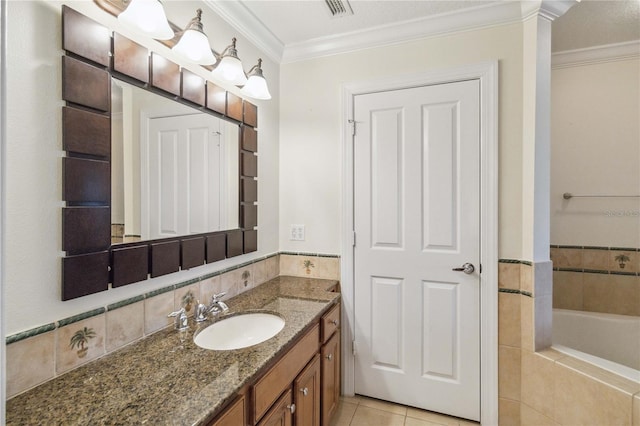 bathroom featuring tile patterned flooring, vanity, and ornamental molding