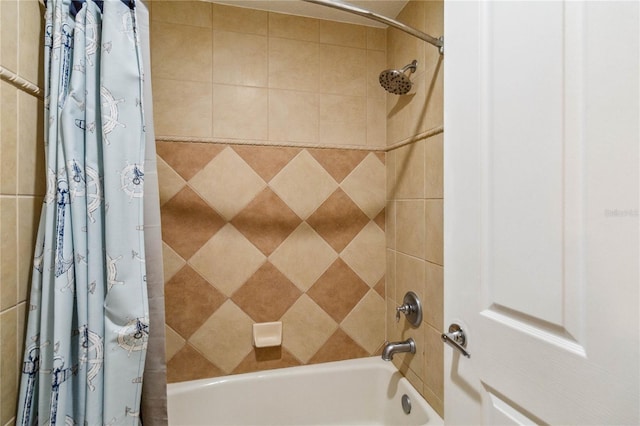 bathroom featuring shower / bathtub combination with curtain