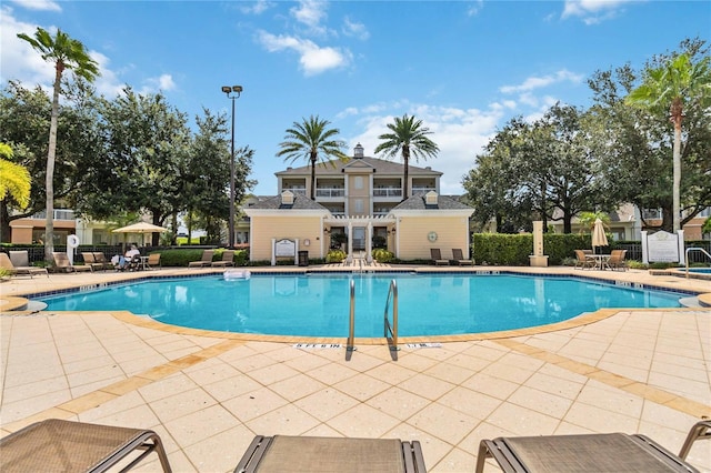 view of pool with a patio