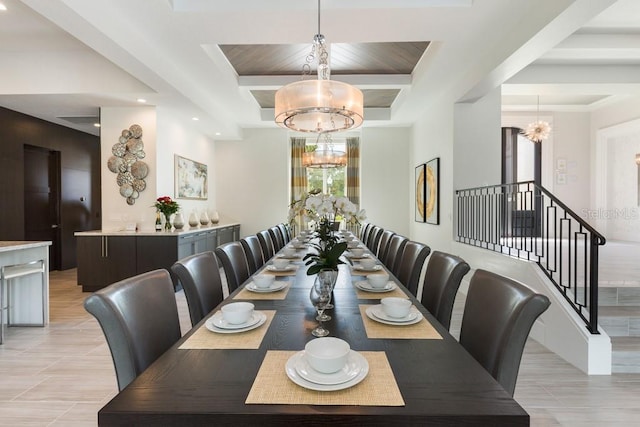 dining space featuring a notable chandelier and light tile patterned floors