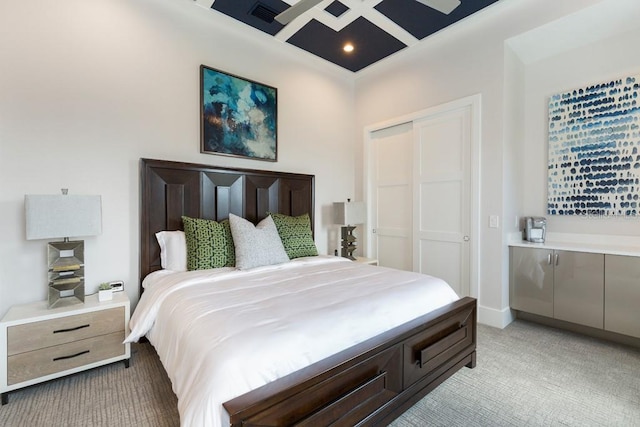 carpeted bedroom with a closet