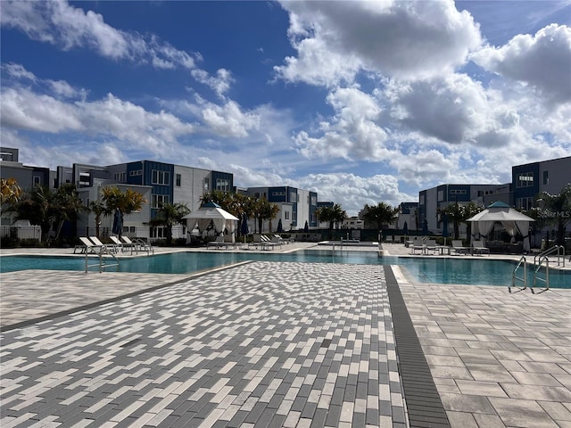 view of swimming pool featuring a patio