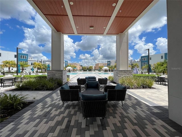 view of patio / terrace featuring a community pool