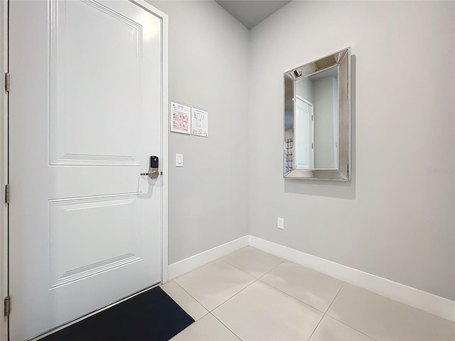 entryway featuring light tile patterned flooring