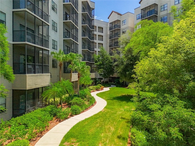 view of community featuring a yard