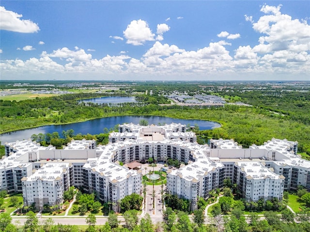 drone / aerial view featuring a water view and a city view