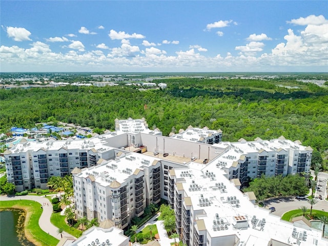 bird's eye view featuring a wooded view