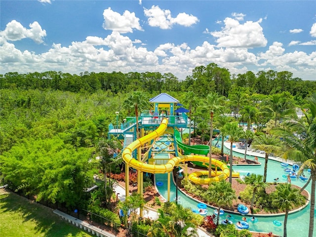 community play area featuring a view of trees