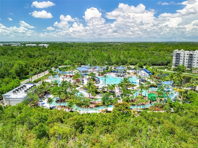 drone / aerial view featuring a view of trees