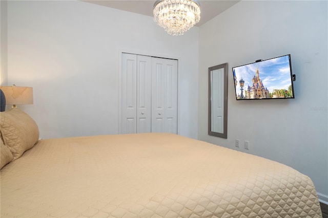 bedroom with a notable chandelier