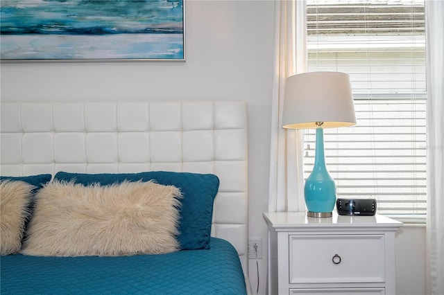 bedroom featuring multiple windows