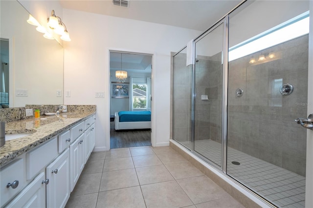 bathroom featuring an enclosed shower, hardwood / wood-style floors, and dual bowl vanity