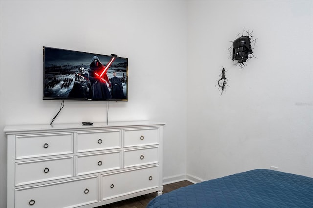 bedroom featuring dark hardwood / wood-style floors