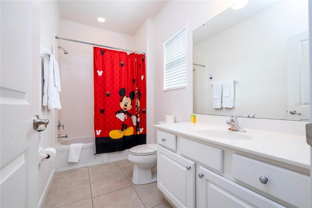 full bath with shower / tub combo with curtain, vanity, toilet, and tile patterned floors