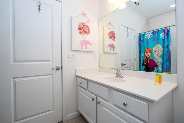 full bathroom featuring visible vents and vanity