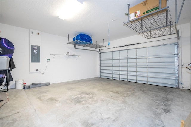 garage featuring concrete block wall