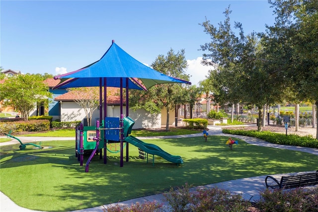 view of jungle gym featuring a yard