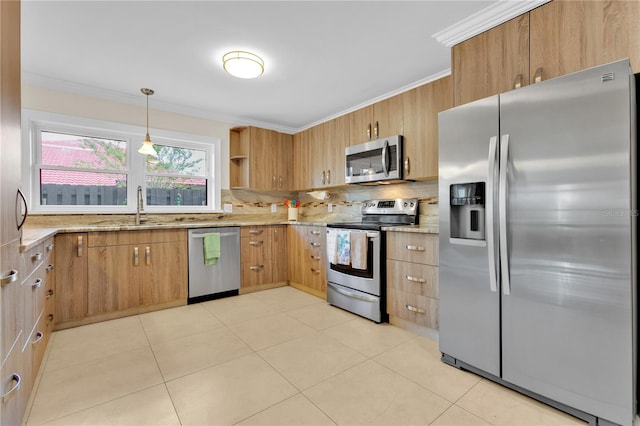 kitchen featuring light tile patterned floors, crown molding, stainless steel appliances, and light stone countertops