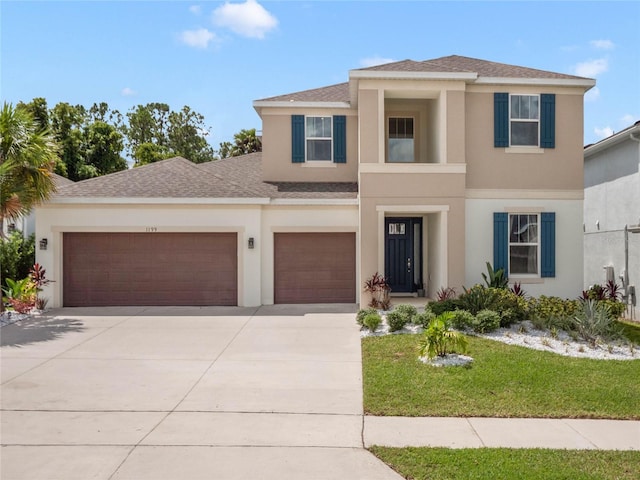 view of front of home with a garage