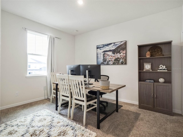 office with carpet floors and baseboards