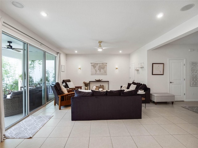 tiled living room with ceiling fan