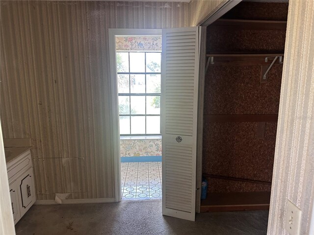 interior space featuring tile patterned flooring and vanity