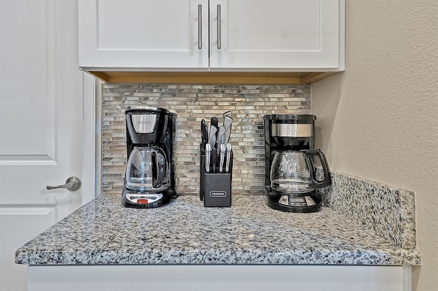 interior details featuring decorative backsplash