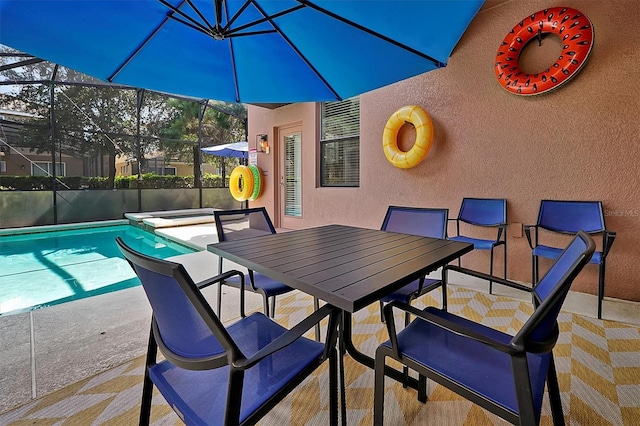 view of patio / terrace with outdoor dining area, a lanai, and a pool with connected hot tub