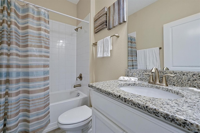 bathroom featuring vanity, toilet, and shower / tub combo with curtain