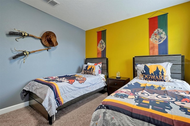 carpeted bedroom with a textured ceiling and lofted ceiling