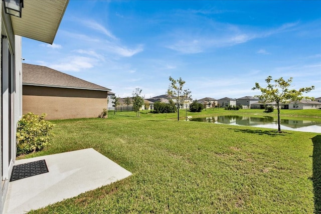 view of yard with a water view