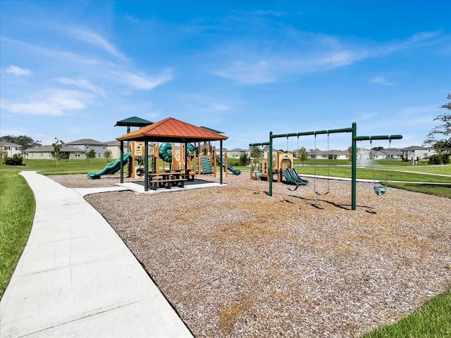 view of jungle gym with a yard