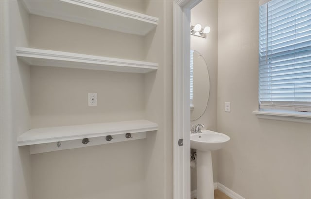 bathroom with sink and plenty of natural light