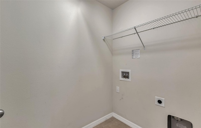 laundry area featuring tile patterned flooring, electric dryer hookup, and hookup for a washing machine