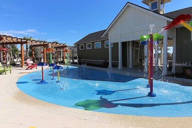 view of pool featuring a pergola and a patio