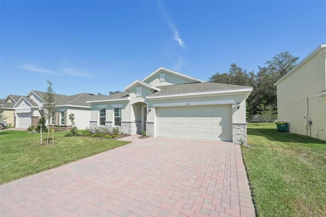 craftsman-style home with a front yard and a garage