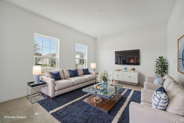 living room with tile patterned floors