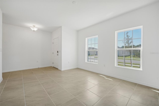 view of tiled spare room