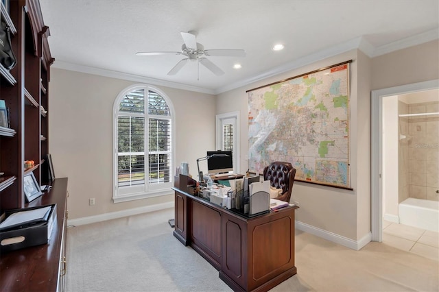 carpeted office with plenty of natural light, ceiling fan, and crown molding