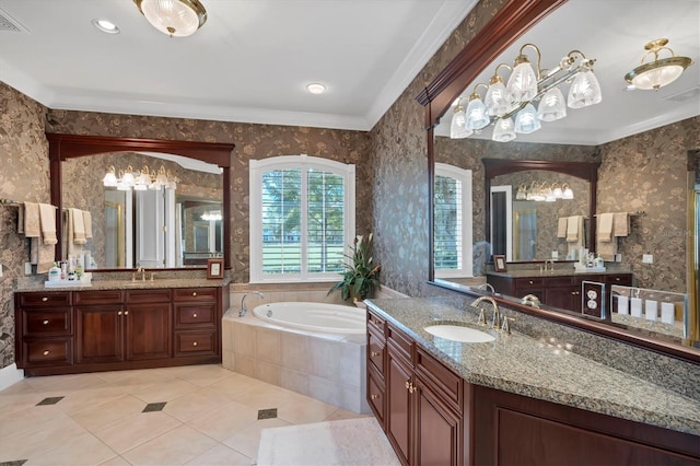 bathroom featuring tiled bath, crown molding, double sink vanity, and tile patterned floors