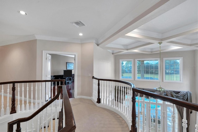 hallway featuring light carpet, coffered ceiling, crown molding, and beam ceiling