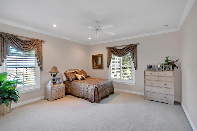 bedroom with ceiling fan, ornamental molding, light carpet, and multiple windows