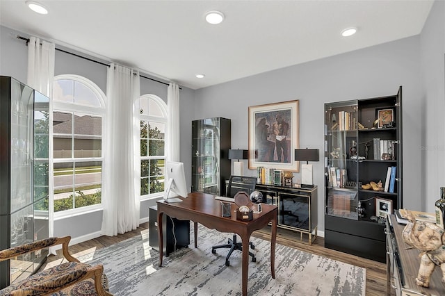 office area with hardwood / wood-style flooring