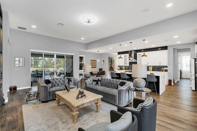 living room with hardwood / wood-style flooring