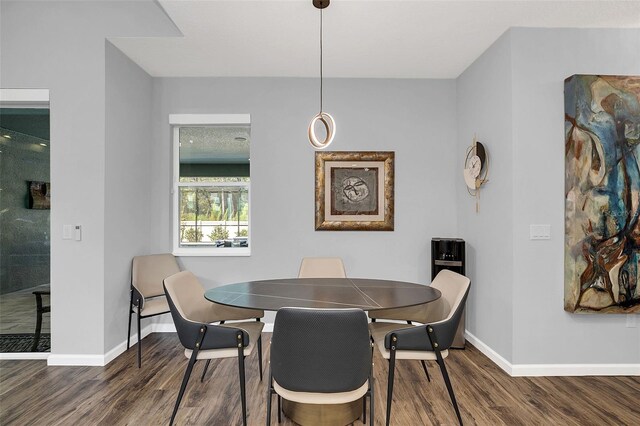 dining room featuring dark hardwood / wood-style flooring