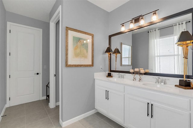 bathroom featuring dual vanity and tile patterned flooring