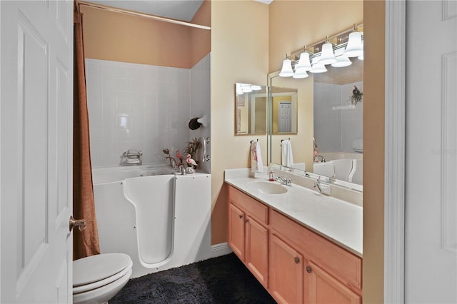 full bathroom with vanity, shower / bathtub combination, and toilet