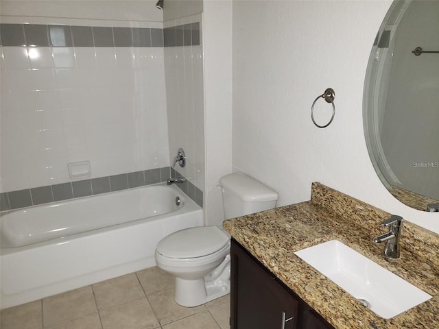 full bath with toilet, shower / bathtub combination, tile patterned flooring, and vanity